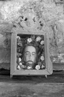 Demi-relief : tête de saint Jean-Baptiste, dite plat de saint Jean, chapelle Notre-Dame (Rostrenen)
